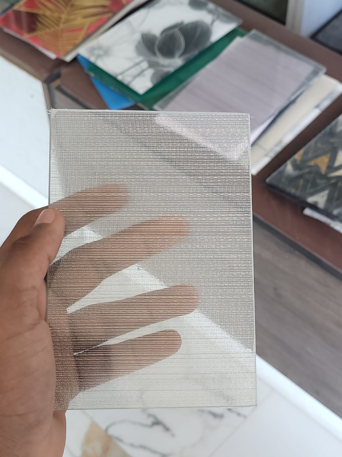 Silver woven texture: decorative glass sample